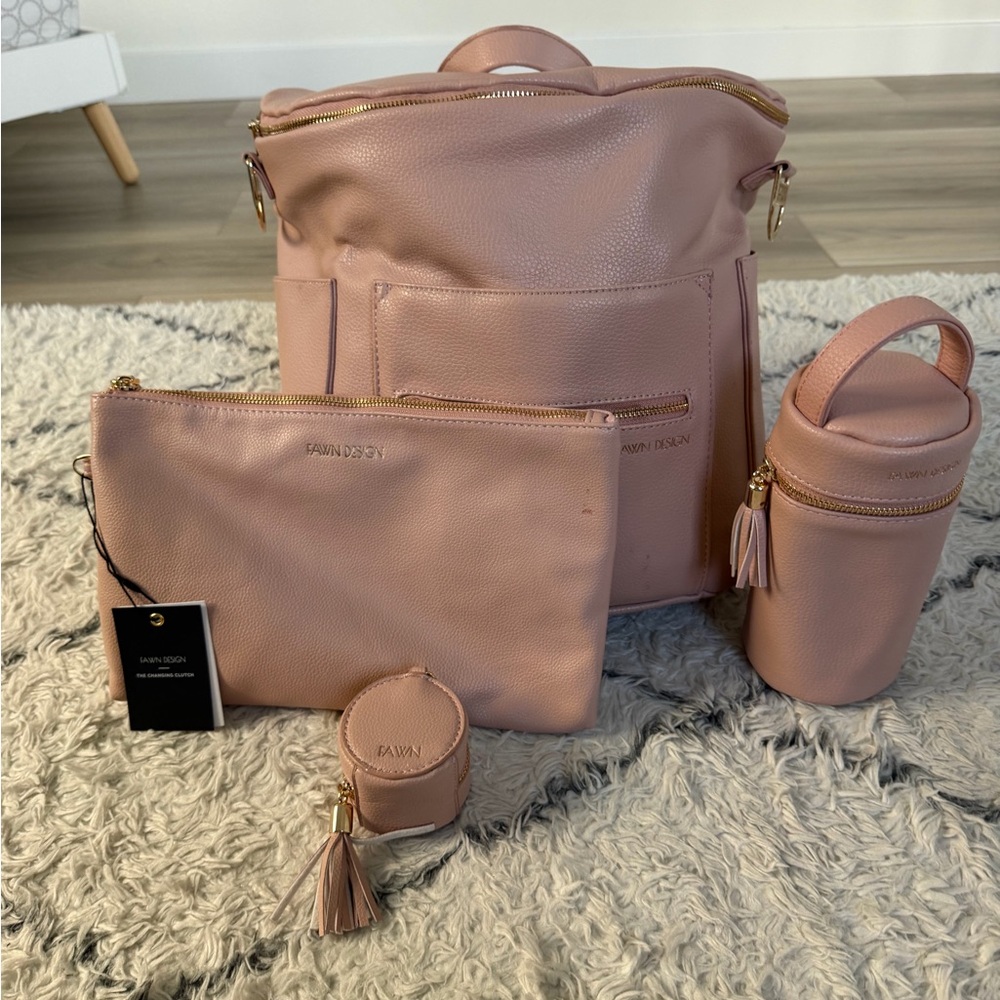Fawn Design Pink Backpack with Gold Zippers, binky and bottle cases.